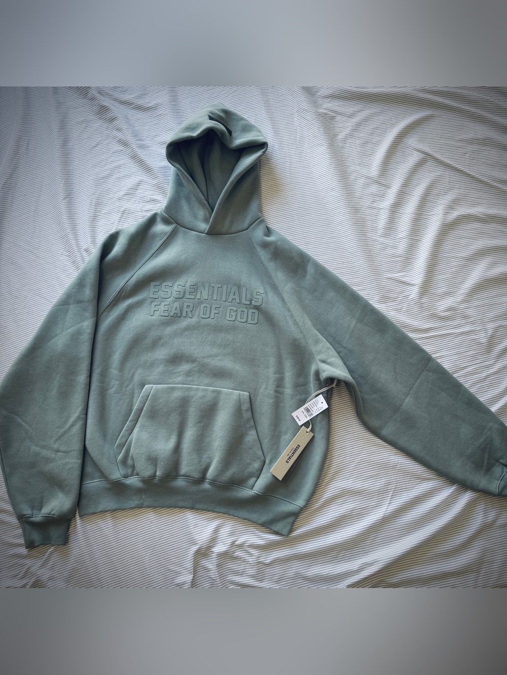 Fear of God Essentials Hoodie in sycamore color, unisex